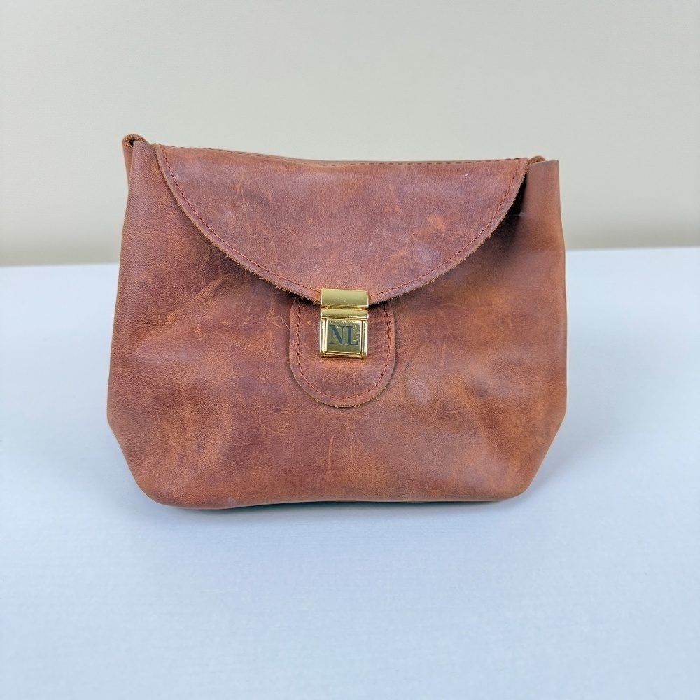 Nichole Lynel Raw Leather Makeup Travel Bag